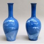PAIR OF ROYAL WORCESTER SABRINA WARE BALUSTER VASES, PAINTED WITH FISH ON A BLUE GROUND BY G H