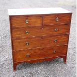 REGENCY MAHOGANY CHEST WITH A CROSS BANDED TOP, TWO DRAWERS AND THREE GRADUATED LONG DRAWERS, ON