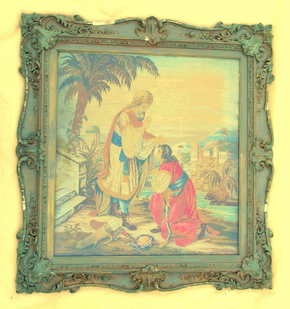 VICTORIAN NEEDLEWORK PICTURE, THE RELIGIOUS SCENE WITH TWO FIGURES IN A LANDSCAPE, IN A MOULDED