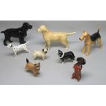 BESWICK MODEL OF AN AIRDALE "CH. CAST IRON MONARCH" (H: 13.5cm) AND SEVEN OTHER MODELS OF DOGS [8]