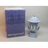 WEDGWOOD BLUE AND WHITE JASPERWARE CAMPANA SHAPED VASE WITH CLASSICAL FIGURES IN RELIEF, TWO LOOP