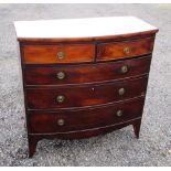 REGENCY MAHOGANY BOW FRONTED CHEST WITH TWO SHORT, THREE GRADUATED LONG DRAWERS, ON SPLAYED FEET (