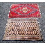 PERSIAN MADDER FIELD RUG WITH A PENDANT MEDALLION CENTRE AND STYLISED FLORAL DECORATION (202cm x