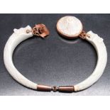 PRE-WAR CARVED IVORY AND ROSE GOLD PANTHER'S HEAD BRACELET, INDISTINCT MARK, POSSIBLY 9 (DIA: 7cm)