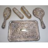 EDWARDIAN SILVER DRESSING TABLE TRAY WITH CHASED AND EMBOSSED FLORAL AND SCROLL DECORATION BY