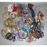 QUANTITY OF NECKLACES ETC. [A LOT]