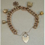 9ct GOLD CURB-LINK BRACELET WITH FIVE GOLD CHARMS (26.5g)