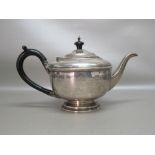 SILVER CIRCULAR TEAPOT WITH EBONISED HANDLE, BY EARNEST W HAYWOOD, BIRMINGHAM 1932, WIDTH 27cm (