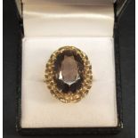 9ct GOLD BASKET WEAVE RING SET OVAL CUT 18mm SMOKY QUARTZ, SIZE O (6.1g GROSS)