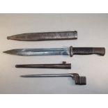 WORLD WAR II BAYONET NUMBERED 5499 IN SCABBARD AND A STICK BAYONET IN SCABBARD [4]