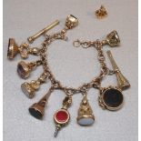 9ct GOLD FANCY CIRCULAR LINK BRACELET WITH FIVE 9ct HARDSTONE SEAL FOBS, ONE 15ct GOLD FOB, FIVE