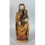 18th CENTURY CARVED WOOD AND PAINTED FIGURE OF A MAN HOLDING A BABY AND OLIVE BRANCH (H: 42cm