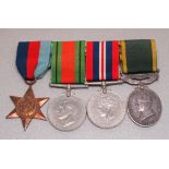 WORLD WAR II GROUP OF FOUR MEDALS AWARDED TO J. COMD. J. WRAITH, A.T.S., COMPRISING THE 1939-45