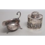 GEORGE V SILVER OVAL TEA CADDY CHASED AND EMBOSSED WITH FIGURES, CHESTER 1911 AND A SMALL SAUCE