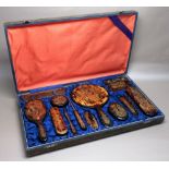 TORTOISESHELL WARE LADY'S DRESSING TABLE SET WITH GILT CHINOISERIE DECORATION OF 12 PIECES, CASED [