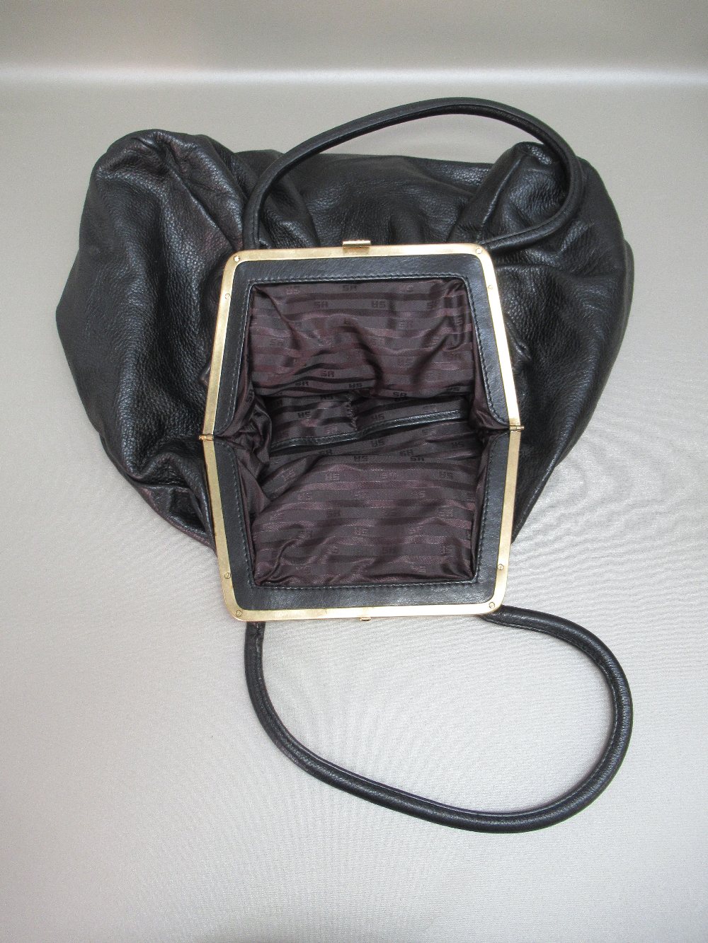 SONIA RYKIEL BLACK LEATHER HANDBAG WITH GILT METAL SNAP CLASP AND TWO LEATHER HANDLES, W: 44cm, - Image 8 of 8