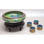 CHINESE CLOISONNE MOULDED CIRCULAR BOWL WITH FLORAL DECORATION ON A GREEN GROUND (DIA: 20cm), ON A