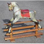 AYRES, LONDON, PAINTED WOOD MODEL OF A DAPPLE GREY ROCKING HORSE ON SAFETY STAND (123cm x 137.5cm