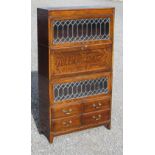GLOBE WERNICKE STYLE OAK FOUR SECTION BUREAU BOOKCASE WITH TWO LEAD GLAZED DOORS AND FOUR DRAWERS