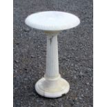 SPANISH CARVED ALABASTER CIRCULAR TABLE, THE CIRCULAR TOP WITH DECORATED RIM, ON A REEDED COLUMN,