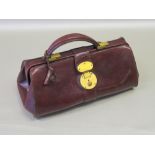 GLADSTONE STYLE BROWN LEATHER HANDBAG WITH BRASS MOUNTS LABELLED "GLORIA (GROSS) DESIGNER CLOTHES/