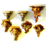 SET OF THREE ITALIAN FLORENTINE CARVED GILTWOOD GRADUATED WALL SHELVES, EACH WITH A SHAPED