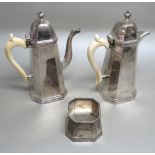HEAVY GUAGE GEORGE VI SILVER COFFEE POT OF TAPERING OCTAGONAL FORM WITH A BIRD'S HEAD SCROLL