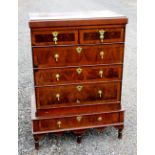 GEORGE II AND LATER COUNTRY WALNUT AND ELM CHEST, THE CROSSBANDED FRONT WITH TWO SHORT, THREE