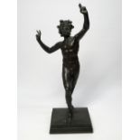 A 19TH CENTURY GRAND TOUR BRONZE AFTER THE ANTIQUE, BEING A SCALE COPY OF THE DANCING FAUN AT