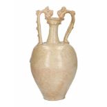 A large cream glazed pottery double dragon amphora. Ornamented with two double strand handles ending