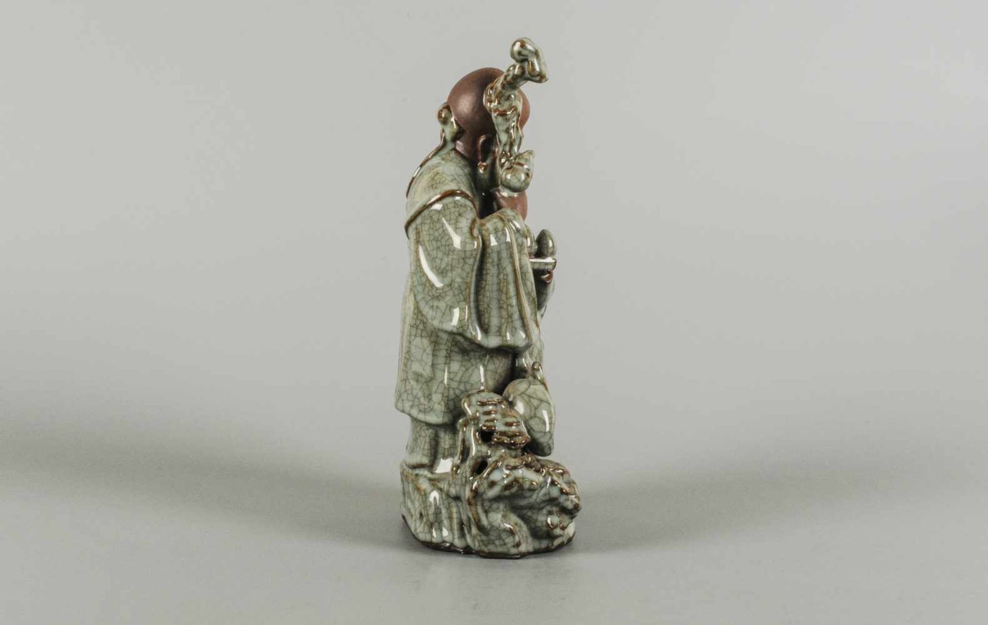 A glazed ceramic sculpture depicting an old man and a child. Unmarked. China, Lonzquan, 20th - Image 5 of 6