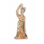 A polychrome earthenware court lady with long sleeves and a raised arm. China, Han/Tang. H. 33 cm.