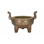 A green glazed pottery iridescent tripod censer. China, Han. L. 23 cm. With vintage collection