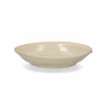 A cream glazed porcelain shallow Ding bowl. The outside wall with a relief decor of banana leaf