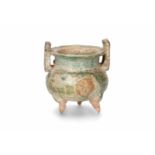 A tripod pottery baluster vessel in the shape of a bronze archaic jar with iridescent celadon glaze.