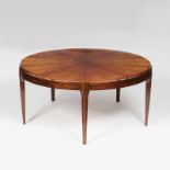 Eleganter Mid-Century Coffee-Table Frankreich, um 1960. Tropisches Edelholz, furniert. Runde