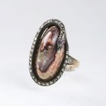 Antiker Opal-Diamant-Ring 'Schlange' 19. Jh. 18 kt. Roségold mit Silber. Spitzovales Muttergestein
