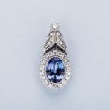 AN 18K WHITE GOLD, TANZANITE AND DIAMOND PENDANT the GISA certiﬁed Intense Blue Violet oval