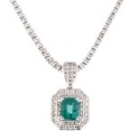AN 18K WHITE GOLD, EMERALD AND DIAMOND NECK PIECE the 2.03ct claw-set emerald-cut emerald,