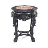 A CHINESE EXPORT EBONISED AND MARBLE-TOPPED LOW TABLE the octagonal red-veined marble top within a