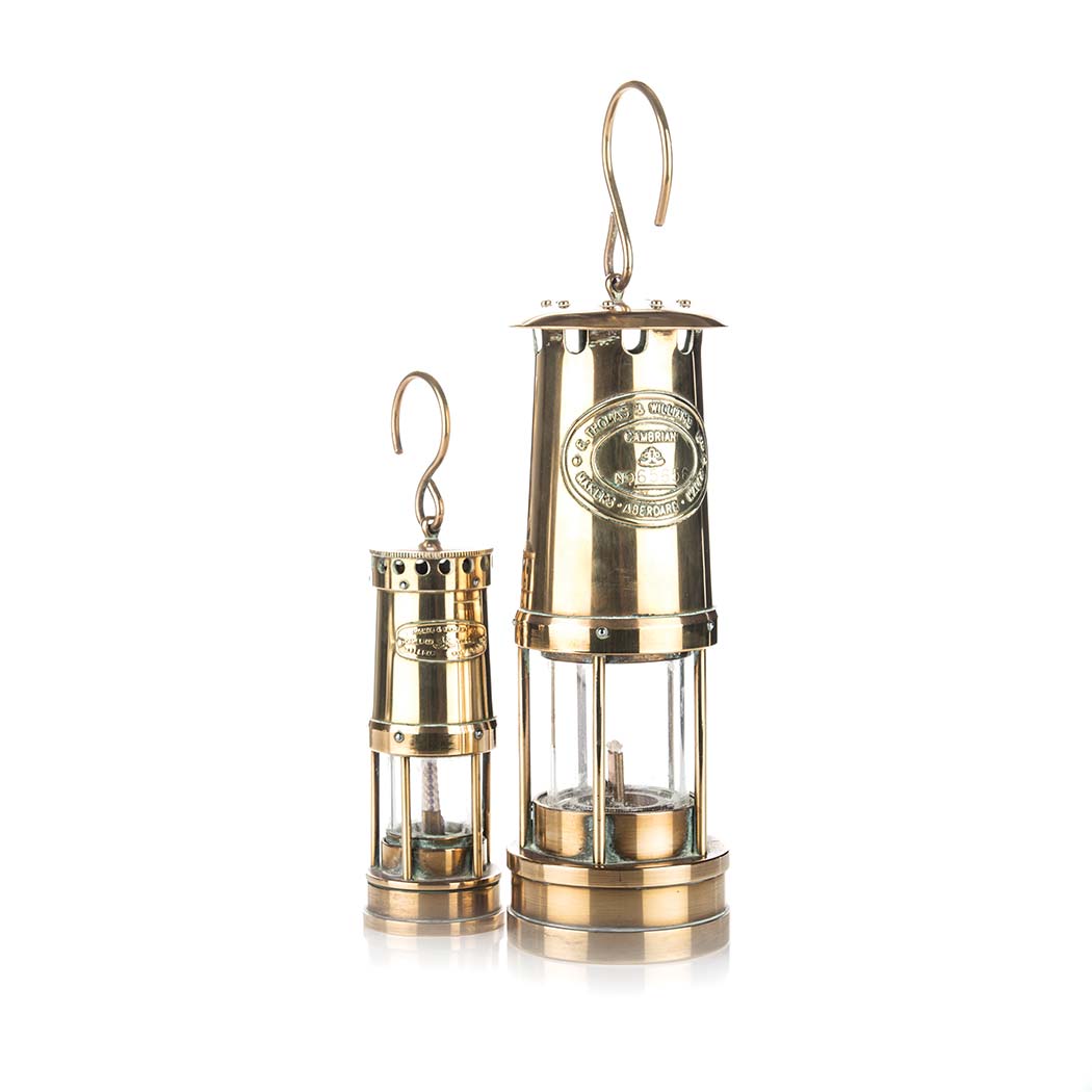 A SET OF BRASS MINERS PARAFFIN LAMPS of typical form tallest 25cm high excluding handle (2)