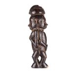 A YAKA FERTILITY FIGURE, DEMOCRATIC REPUBLIC OF CONGO, MID 20TH CENTURY the janus figure carved as