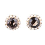 A PAIR OF SMOKEY QUARTS AND PEARL EARRINGS the smokey quartz, weighing approximately 10.76ct in