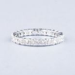 AN 18K WHITE GOLD CLAW-SET FULL ETERNITY RING the diamonds weighing approximately 1.25cts in total