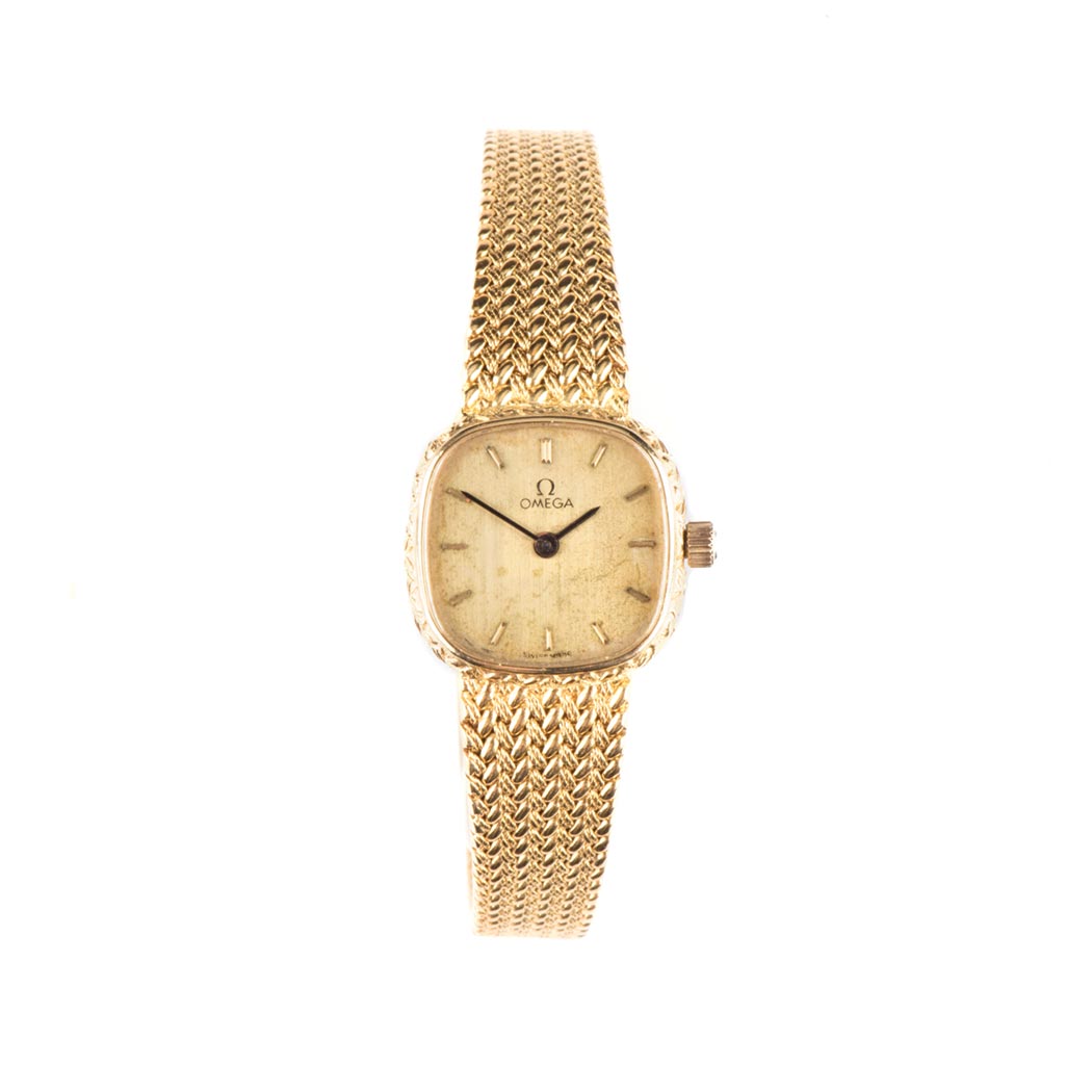AN 18K YELLOW GOLD LADIES WRISTWATCH, OMEGA DE VILLE manual, the square gilt dial applied with baton