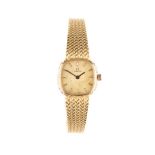 AN 18K YELLOW GOLD LADIES WRISTWATCH, OMEGA DE VILLE manual, the square gilt dial applied with baton