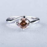 AN 18K WHITE GOLD AND COGNAC DIAMOND SOLITAIRE the approximately 1.18ct cognac diamond, clarity