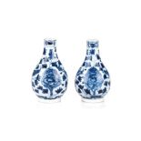 A PAIR OF BLUE AND WHITE MINIATURE VASES, QING DYNASTY, EARLY 18TH/LATE 19TH CENTURY each pear-