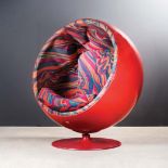 A FIBREGLASS AND UPHOLSTERED BALL CHAIR DESIGNED IN 1966 BY EERO AARNIO FOR ASKO of ball shape