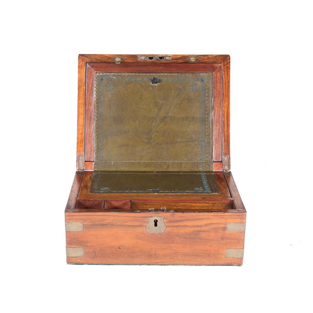 A VICTORIAN BRASS-BOUND MAHOGANY TRAVELLING WRITING DESK